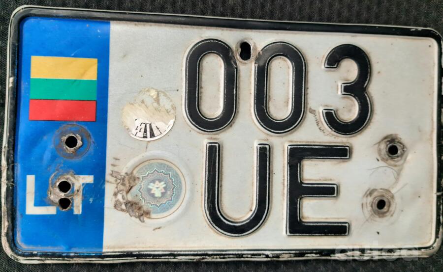 003UE